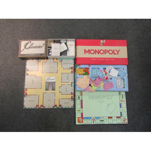 1448 - A vintage Cluedo and Monopoly part set    (E) £15-25