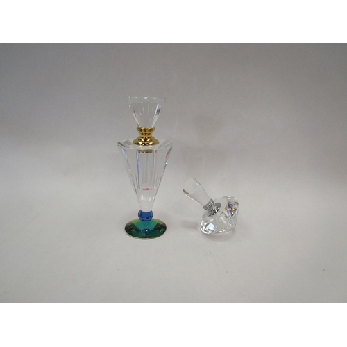 1050 - Two modern glass perfume bottles, one of Art Deco style with cobalt blue base, the other of spinning... 