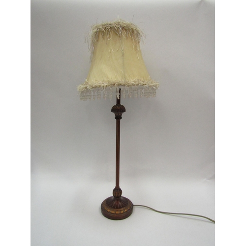 1108 - A modern table lamp, bronzed metal base with feathered effect and beaded shade