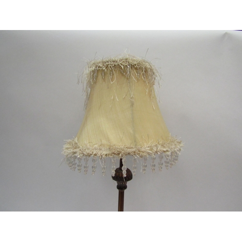 1108 - A modern table lamp, bronzed metal base with feathered effect and beaded shade