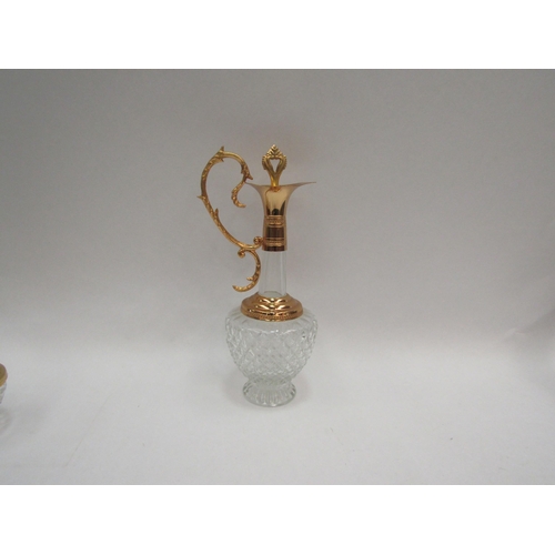 1109 - A modern gilt metal and moulded glass oil decanter together with a pair of salt and pepperettes and ... 