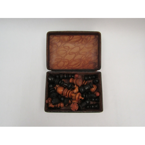 1121 - A boxwood and ebony chess set, some minor losses, the King measures 7cm tall approx., with tooled le... 