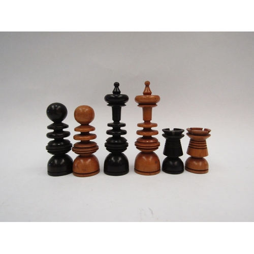 1121 - A boxwood and ebony chess set, some minor losses, the King measures 7cm tall approx., with tooled le... 