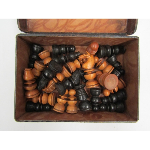 1121 - A boxwood and ebony chess set, some minor losses, the King measures 7cm tall approx., with tooled le... 