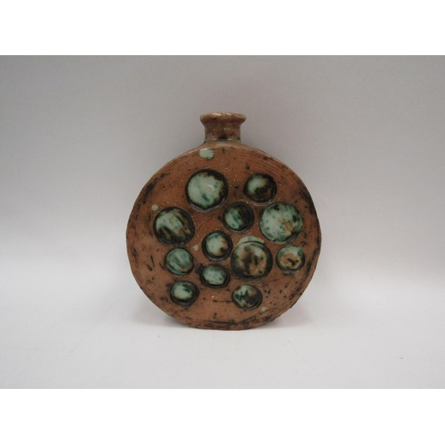 1271 - A Studio Pottery vase of moon flask style form, green glazed roundels, 23.5cm tall