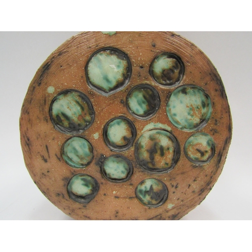 1271 - A Studio Pottery vase of moon flask style form, green glazed roundels, 23.5cm tall