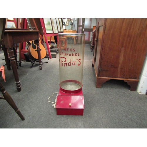 1273 - A 1950's retro peanut dispenser, the chrome top over a plastic cylinder with 