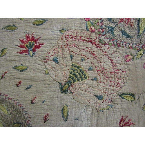 4014 - A Suzani textile, possibly late 19th Century, the large silk hand-embroidered textile is worked on c... 