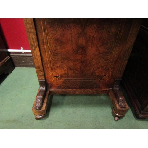 4023 - An Edwardian burr walnut four drawer Davenport with tooled leather writing surface and galleried lif... 