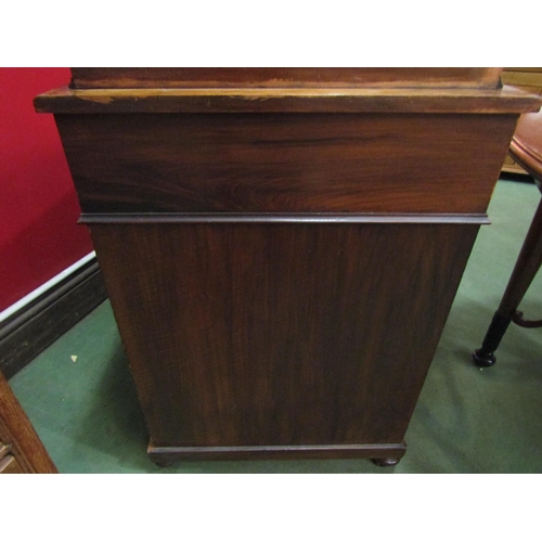 4023 - An Edwardian burr walnut four drawer Davenport with tooled leather writing surface and galleried lif... 