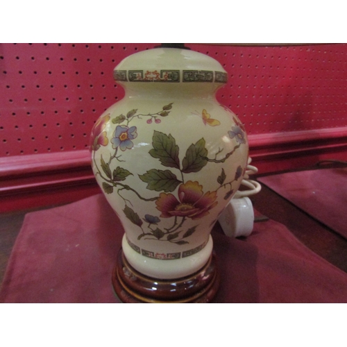 4027 - A Chinese style floral table lamp base with cream pleated shade             (E) £10-20