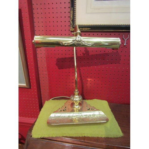 4074 - A brass desk lamp with integral pen tray