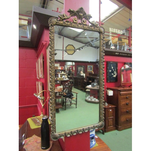 4078 - A gilt decorative hall mirror with acanthus and scroll detail, 72cm x 35cm total