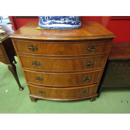 4094 - A Georgian style mahogany bow-front chest of four graduated drawers, 83cm high x 78cm wide x 53cm de... 