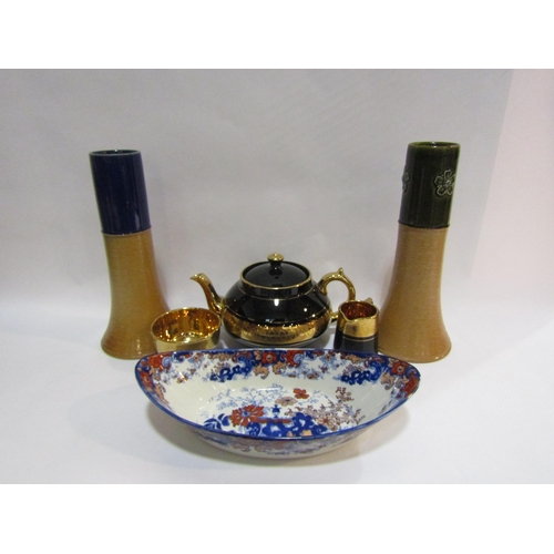 4210 - A pair of Doulton vases, a Sevres black and gold teapot, milk jug and sugar bowl together with a Mas... 