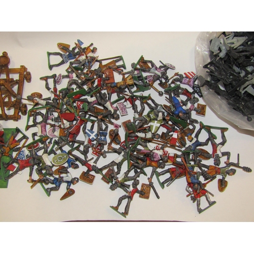 4227 - A large quantity of painted and unpainted plastic soliders