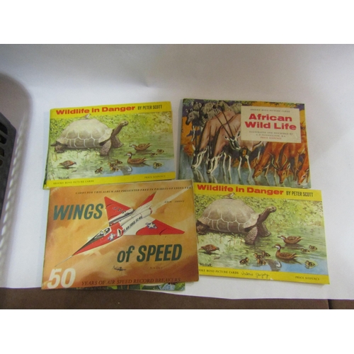 4229 - Brooke Bond and cigarette card albums and tin of tea and cigarette cards