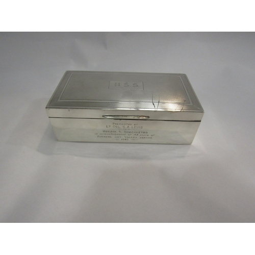 4239 - A silver cigarette box with engraved dedication 