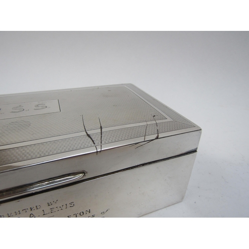 4239 - A silver cigarette box with engraved dedication 