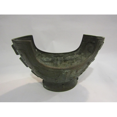 4259 - A Chinese bronze vase of boat form         (E) £30-40