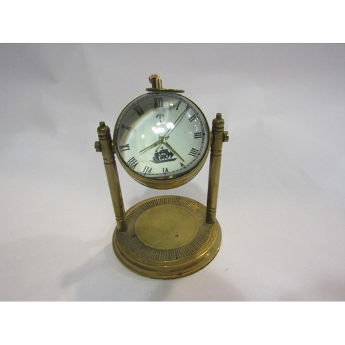 4260 - A brass desk clock on swivel base        (E) £20-30