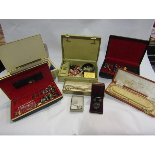 4261 - A quantity of costume jewellery and jewellery boxes