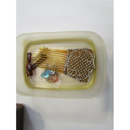 4307 - A vintage travel case with bijouterie contents to include paste set hair comb and similar hair grips... 