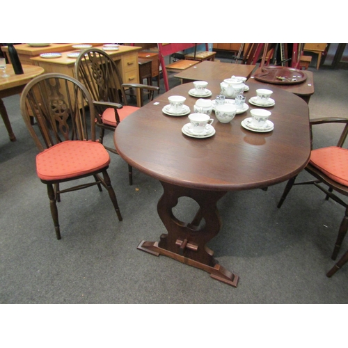 1105 - An Old Charm style extending D-end trestle dining table and set of four wheelback chairs (2+2 carver... 