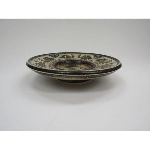 7008 - A Royal Copenhagen bowl by Jorgen Mogensen, relief birds around rim, No.21388 to base, 26cm diameter