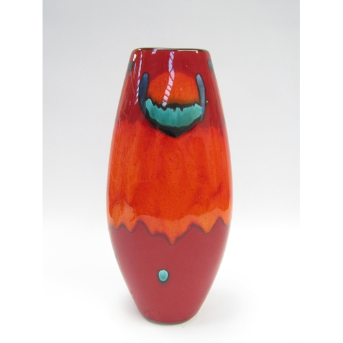 7044 - A modern Poole Pottery large flattened form vase, 'Volcano' range in reds, ornage and blue. 37cm hig... 