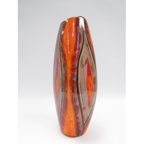 7045 - A modern Poole Pottery large vase with eliptical pattern in reds and orange colours, designed by And... 