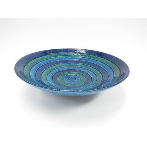 7061 - A large Bitossi Pottery Italian bowl with blue and green banded decoration, 31cm diameter