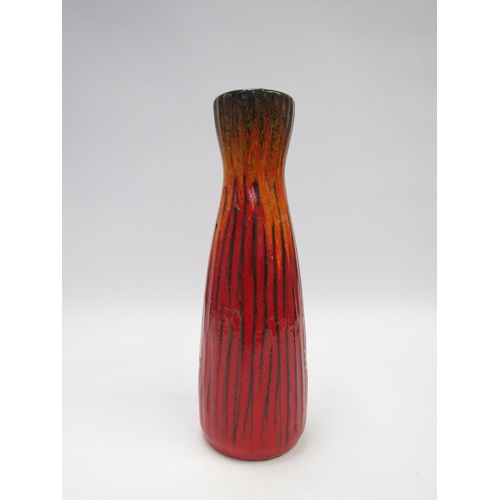 7071 - A Scheurich West German lava glazed vase in red and orange with vertical lines No. 320/28, 28cm high