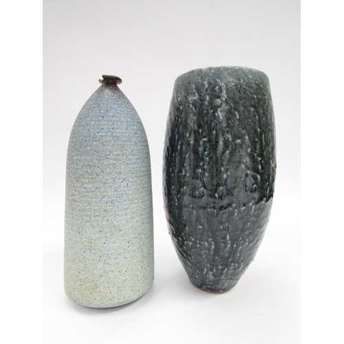 7086 - JONATHAN HANCOCK (XX) A studio pottery tall vase with textured blue glaze for Steam Pottery in Cornw... 