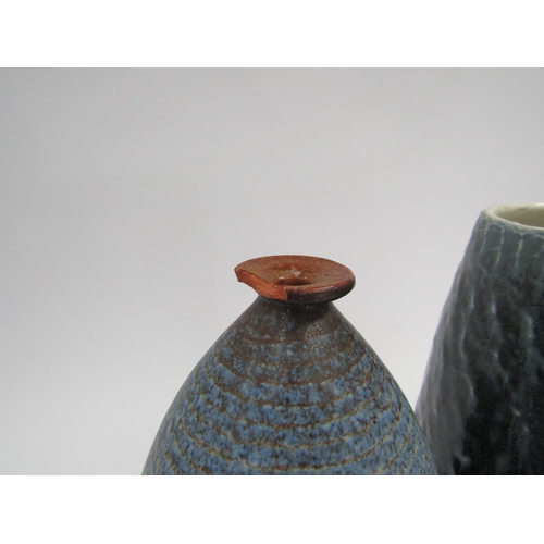 7086 - JONATHAN HANCOCK (XX) A studio pottery tall vase with textured blue glaze for Steam Pottery in Cornw... 