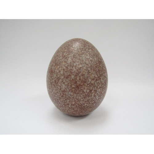 7087 - A studio pottery large salt glaze egg with painted marks to base 