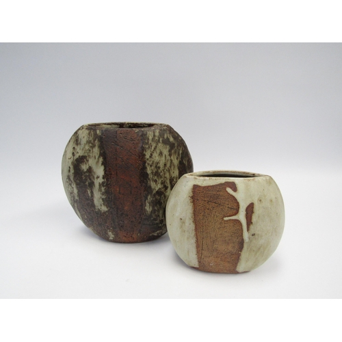 7095 - Two slab-built studio pottery stoneware vases. Potter's mark to base, textured glazes, circa 1960's