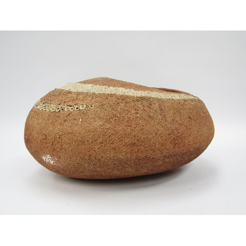 7097 - A pebble form planter pot by Nigel Edmondson, rough layered textured body. 33cm long