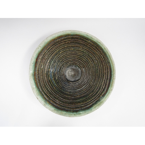 7105 - RUTH DUCKWORTH (1919-2009) A studio pottery large shallow bowl with maised line and dot detail. Pain... 