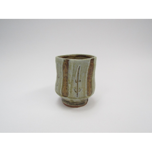 7111 - MIKE DODD (b.1943) A studio pottery Yunomi with impressed potters seal, originally purchased from Go... 