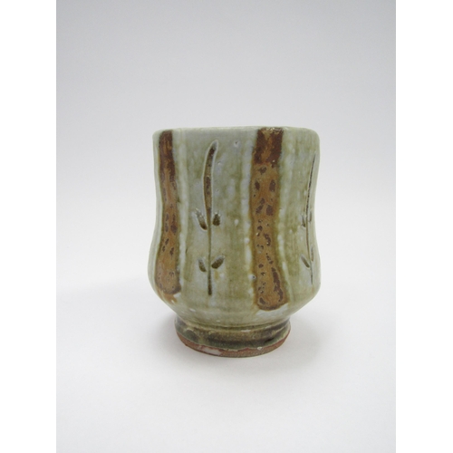 7111 - MIKE DODD (b.1943) A studio pottery Yunomi with impressed potters seal, originally purchased from Go... 