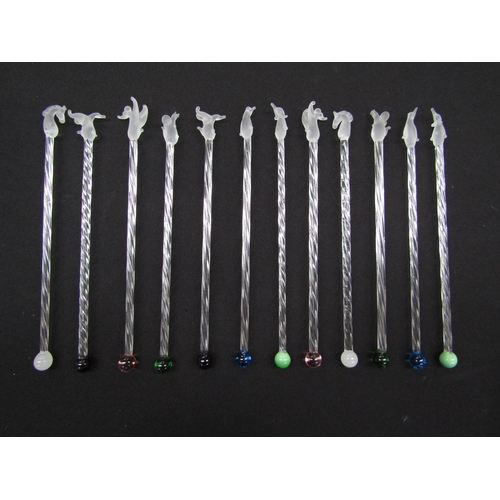 7241 - A collection of twelve Italian glass cocktail stirrers with bird and animal finials and multi colour... 