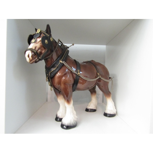 1347 - A Melba Ware china shire horse with harness, 33cm long    (Group)