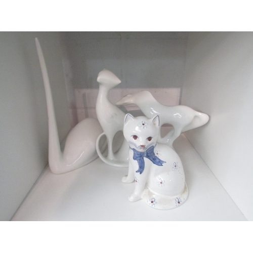 1352 - Three Royal Dux white glazed ceramic animal figures and a Rye pottery seated cat (4)    (C)