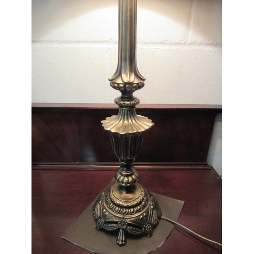 1006 - A brass classical style table lamp base with 1960’s shade    (E) £15-20