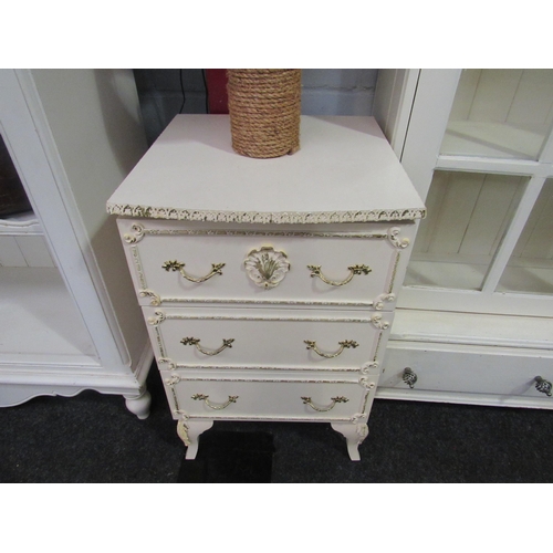 1050 - A pair of bedside chests of three drawers, 68cm high x 42cm wide x 43cm deep