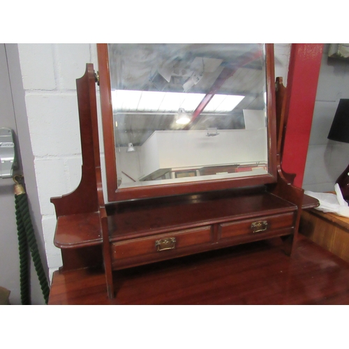 1063 - An Edwardian mahogany dressing chest, the tilt mirror over six drawers, 165cm high x 106cm wide x 52... 