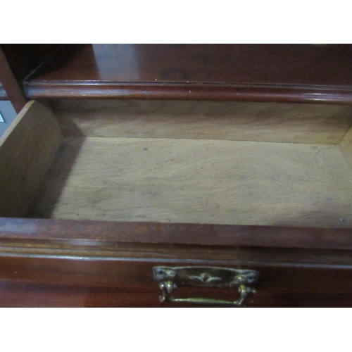 1063 - An Edwardian mahogany dressing chest, the tilt mirror over six drawers, 165cm high x 106cm wide x 52... 