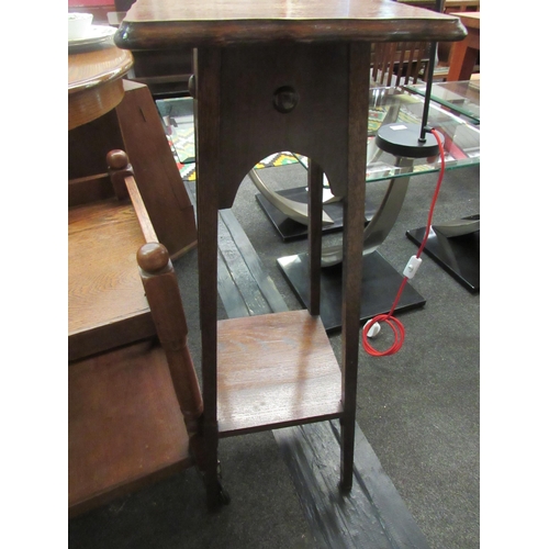 1073 - An early 20th Century oak tea trolley and a two tier oak jardiniere stand