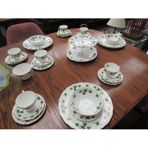 1075 - A quantity of Colclough ivy leaf pattern tea wares including two tier cake plate, cups and saucers e... 